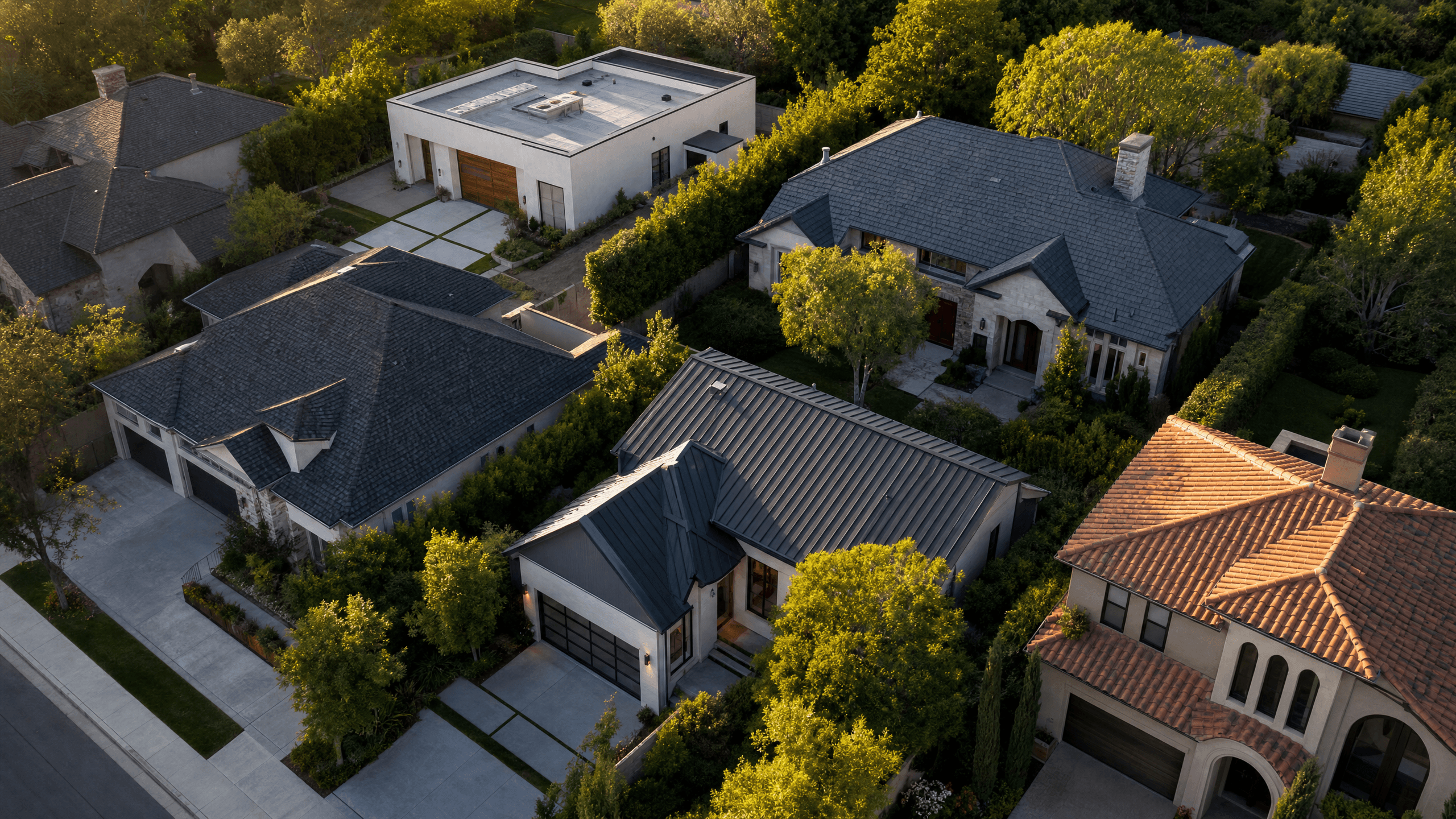 Aerial neighborhood view showing a mix of commercial and residential roof types